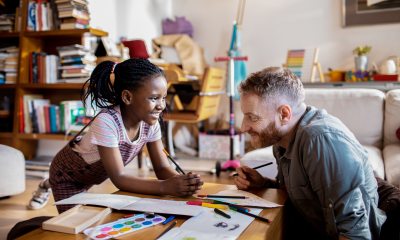 Dad coloring with daughter