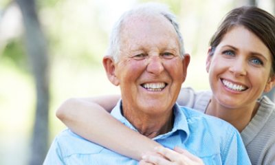 older man and young woman caregiver