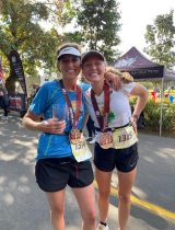 PeaceHealth caregiver Tara Twing poses with her daughter at the APPLETREE finish line.