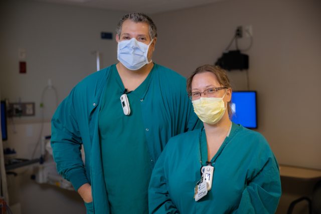 Two caregivers standing next to each other